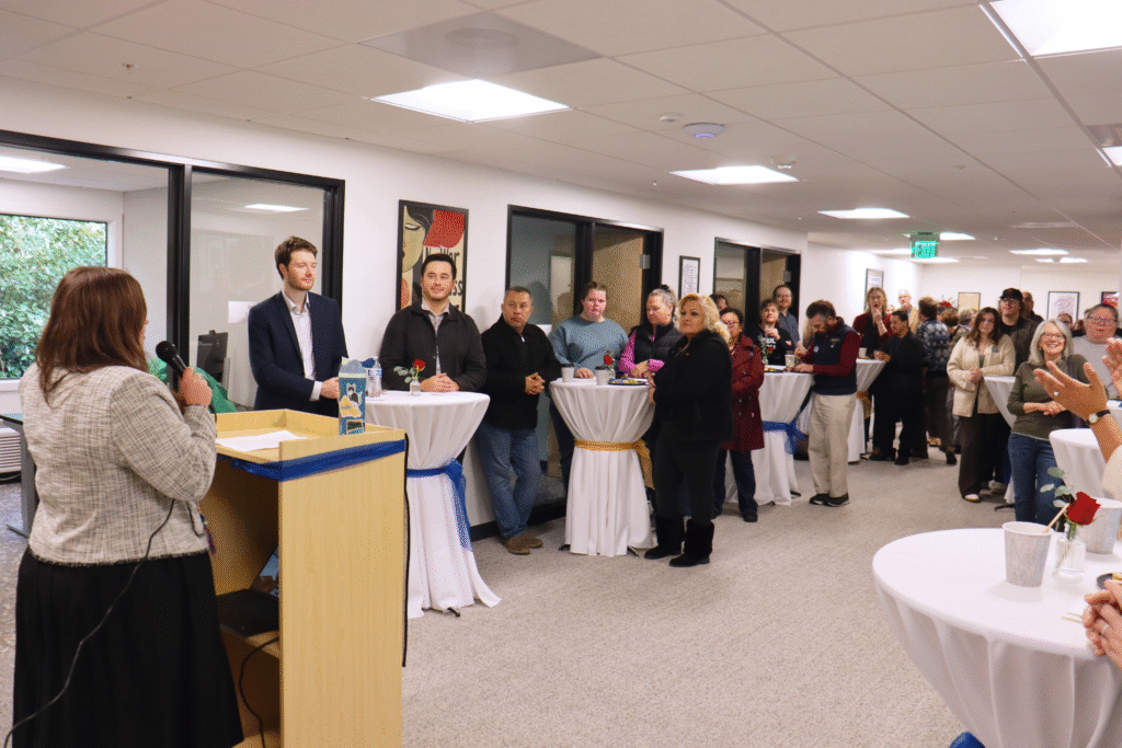 Business Manager Corinne Cosentino with opening remarks